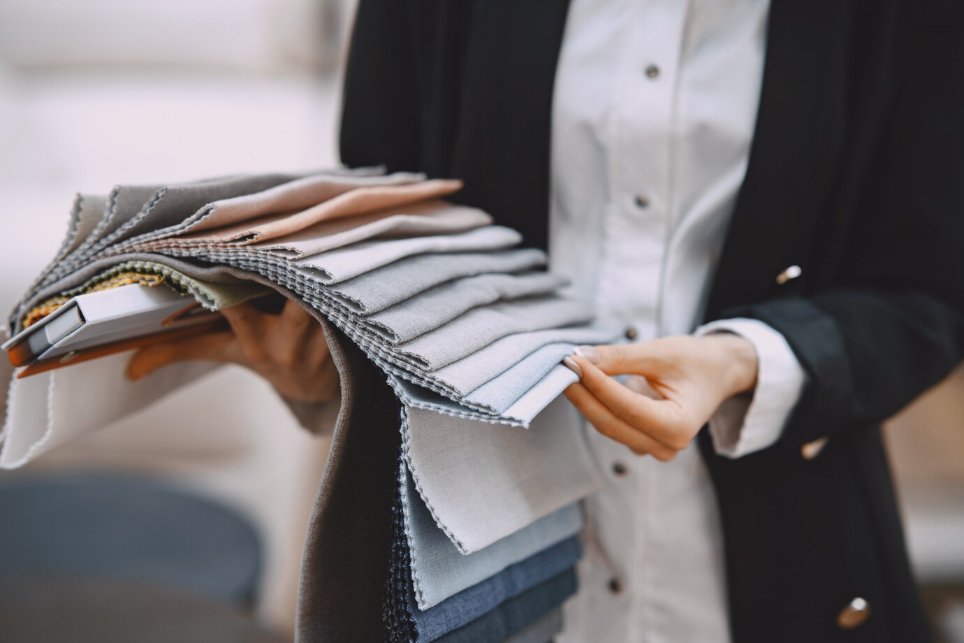 woman choosing fabric colour